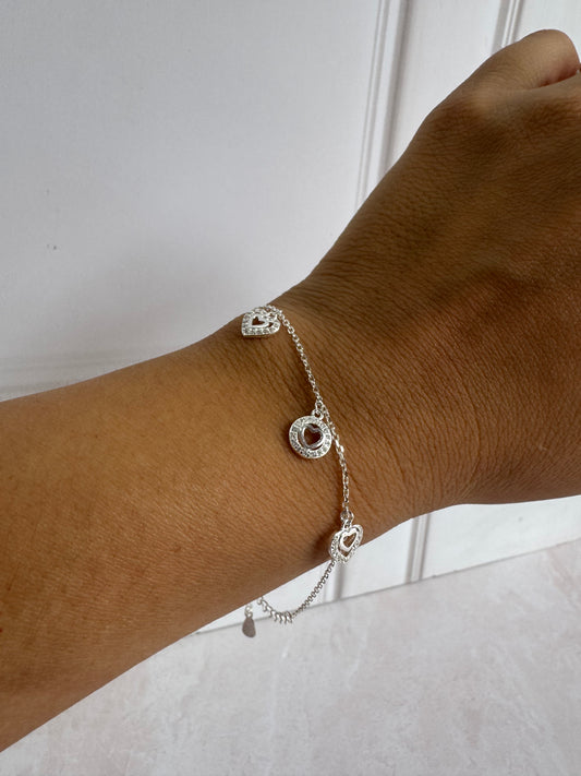 Pulsera Corazones colgantes círculo