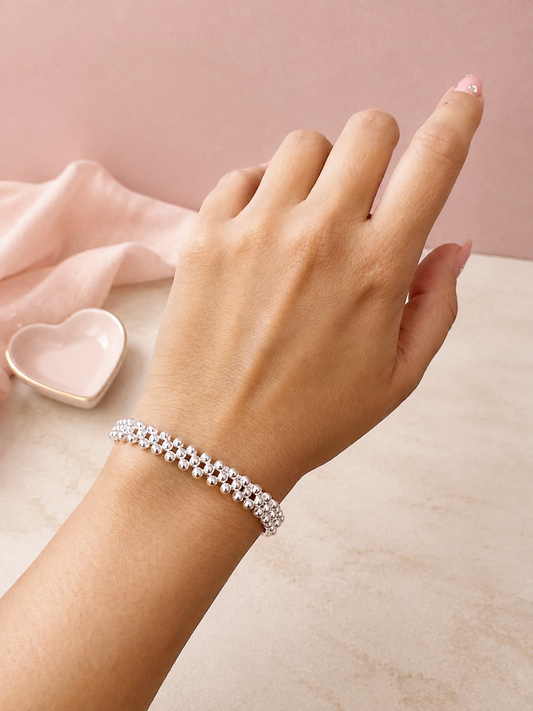 Pulsera Elástica Bolitas Cruzada | Plata .925 – Romina Joyería