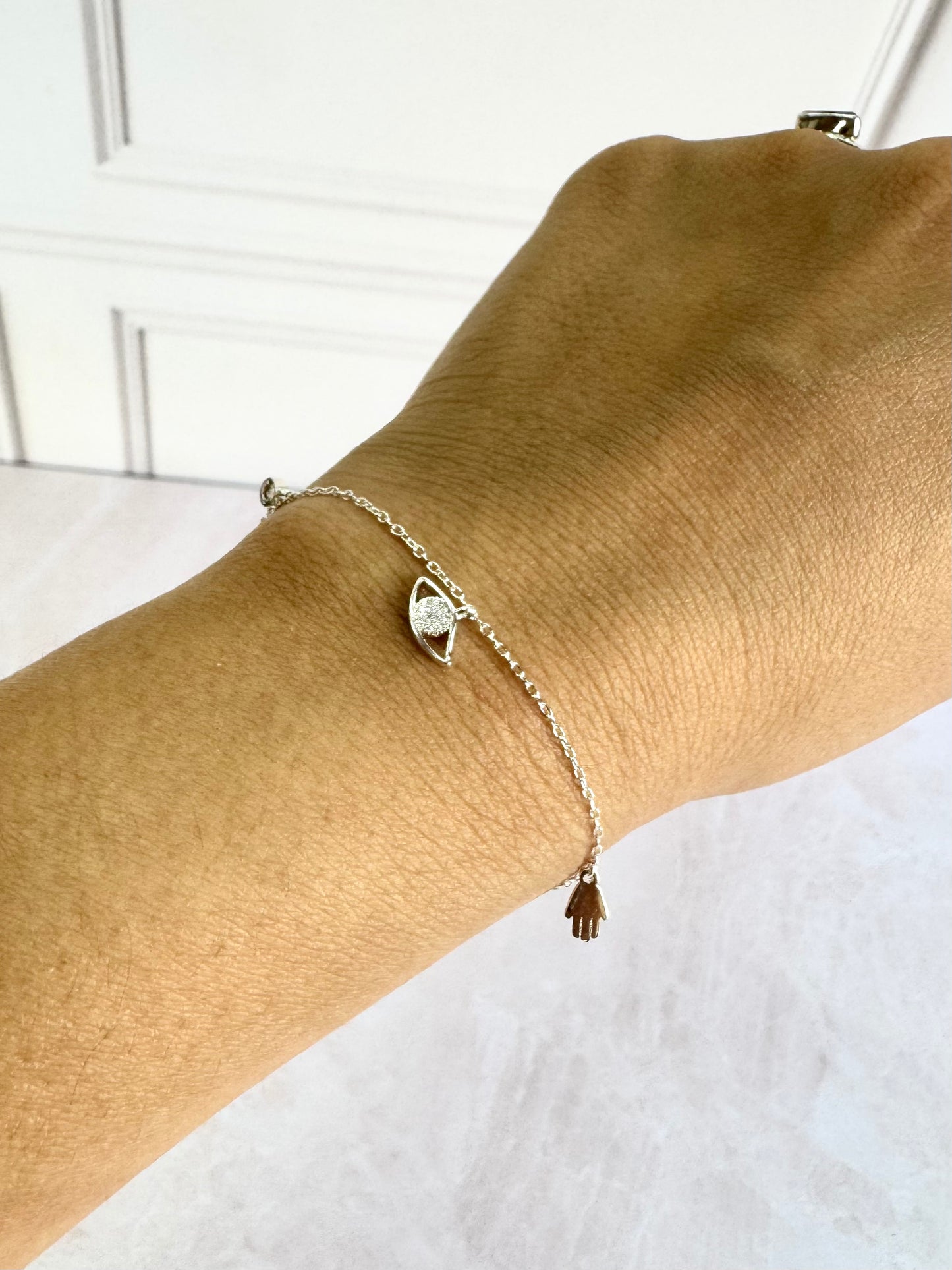 Pulsera mini ojo y manita